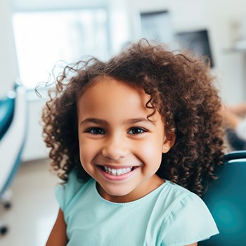 Little girl smiling at the dentist’s office
