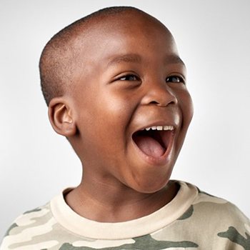 Boy smiles after visiting his Duncanville children’s dentist 