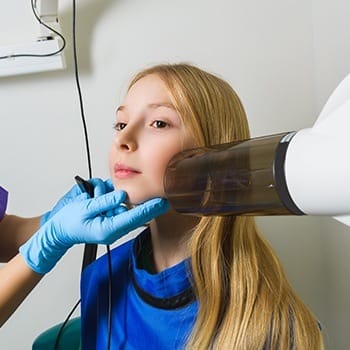 Child receiving digital x-rays