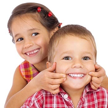 Two smiling young kids