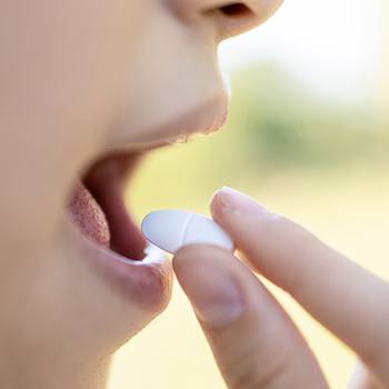 Child taking oral medication