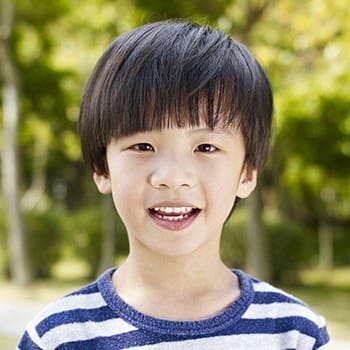 Young boy with healthy smile
