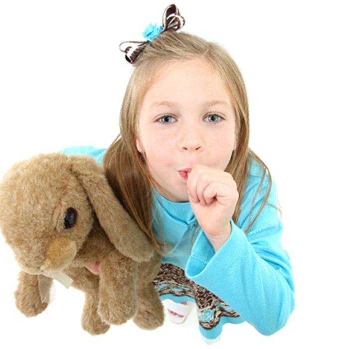 A little girl wearing a blue dress and holding a bunny is seen practicing thumb-sucking in Duncanville