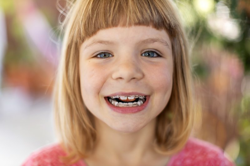little girl with orthodontics