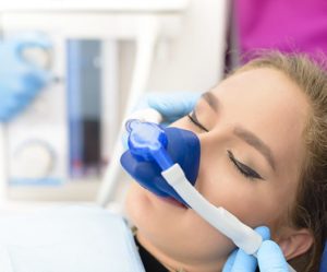 Young woman benefiting from nitrous oxide sedation