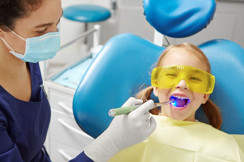 children sitting in the dentist's chair