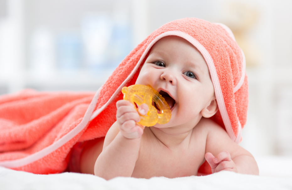 Baby with teething ring