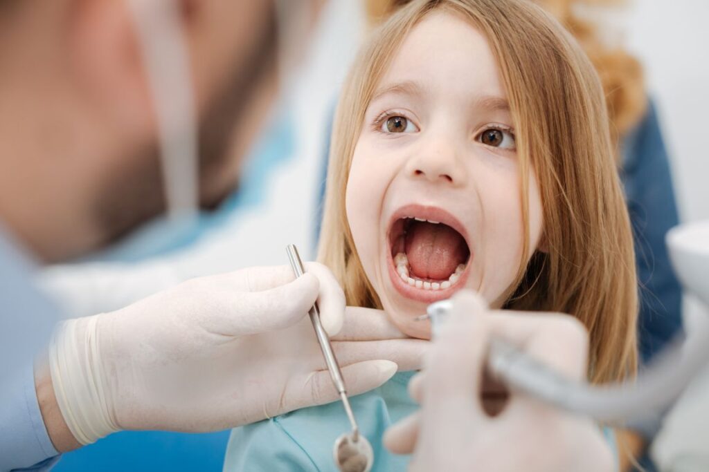A little girl at the dentist